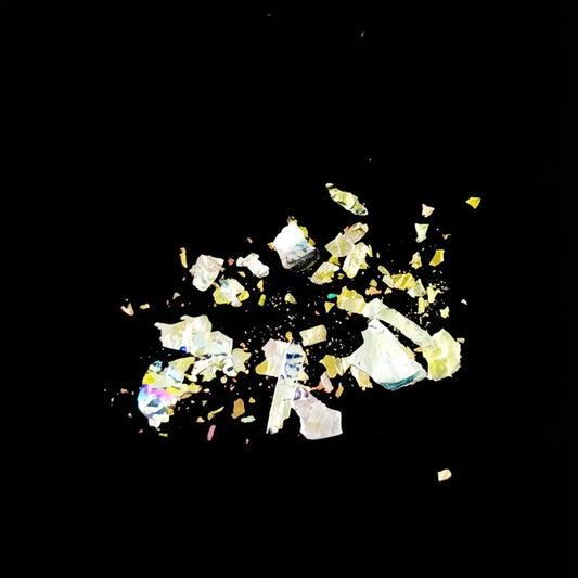 amber gold to emerald green flake pigment effect on black background