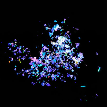 sapphire blue to ruby red flake pigment effect on black background
