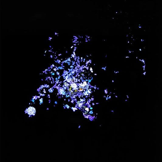 sapphire blue to violet purple flake pigment effect on black background