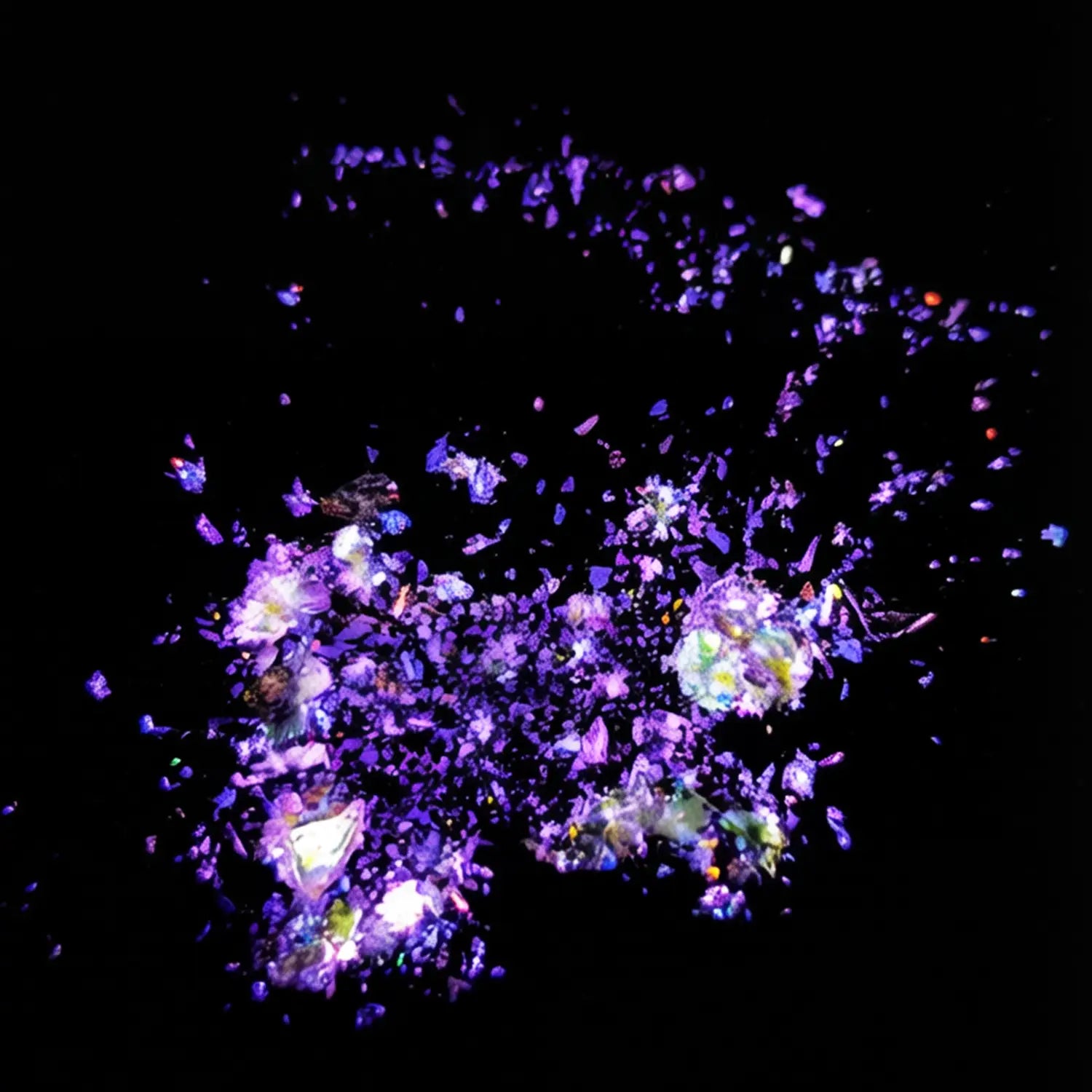 violet purple to ruby magenta flake pigment effect on black background