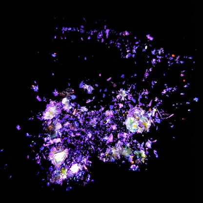 violet purple to ruby magenta flake pigment effect on black background