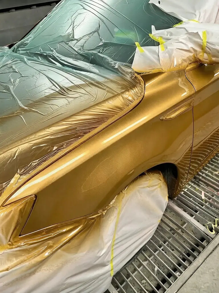 automotive surface coating process using gold metallic effect pigment
