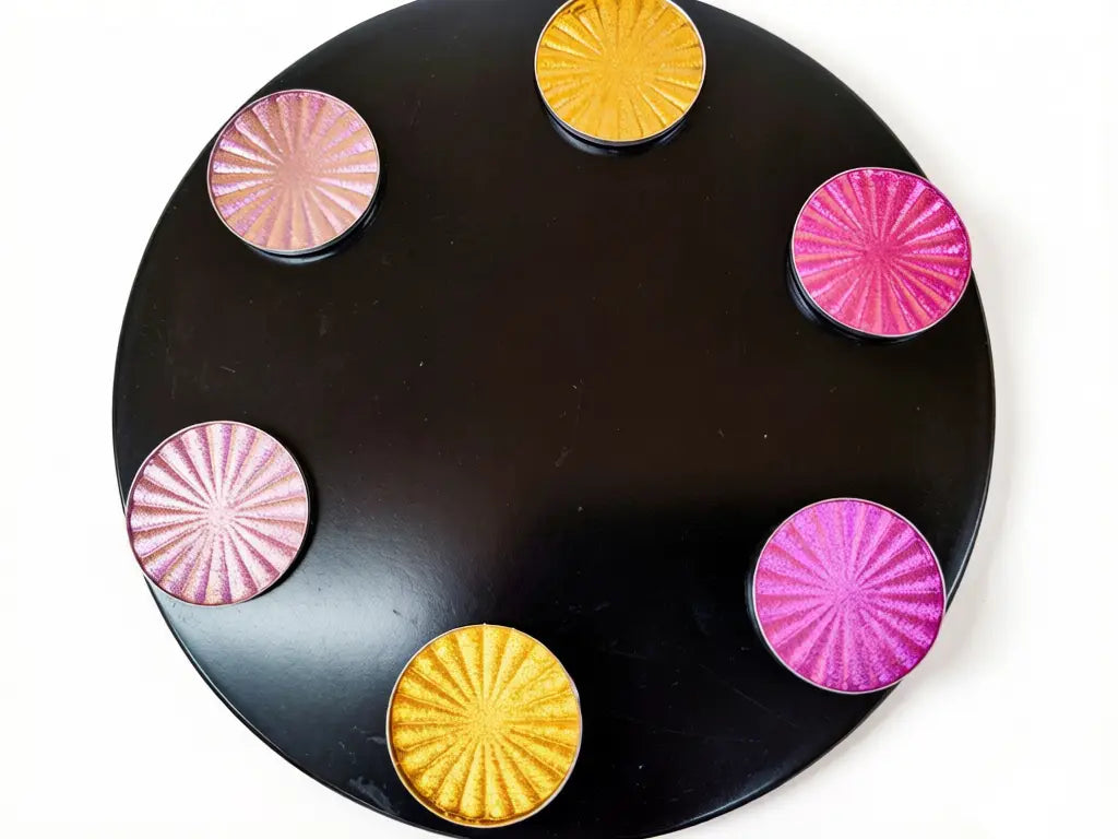 displayed eyeshadows with metallic shimmer and reflective pigment effect